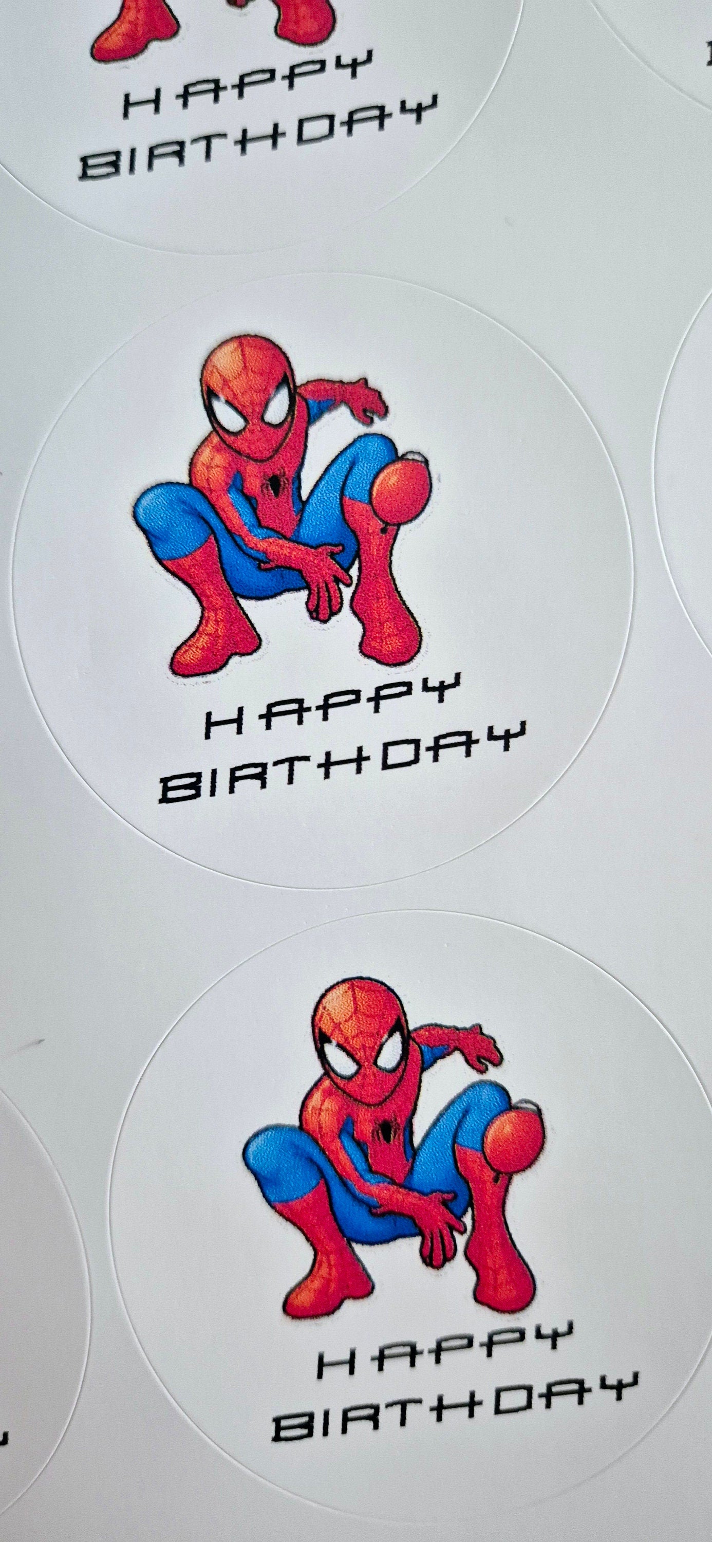 Spider-man inspired themed stickers- 24 Glossy stitch stickers- 45mm circular stickers a4 sheet - 24 in total