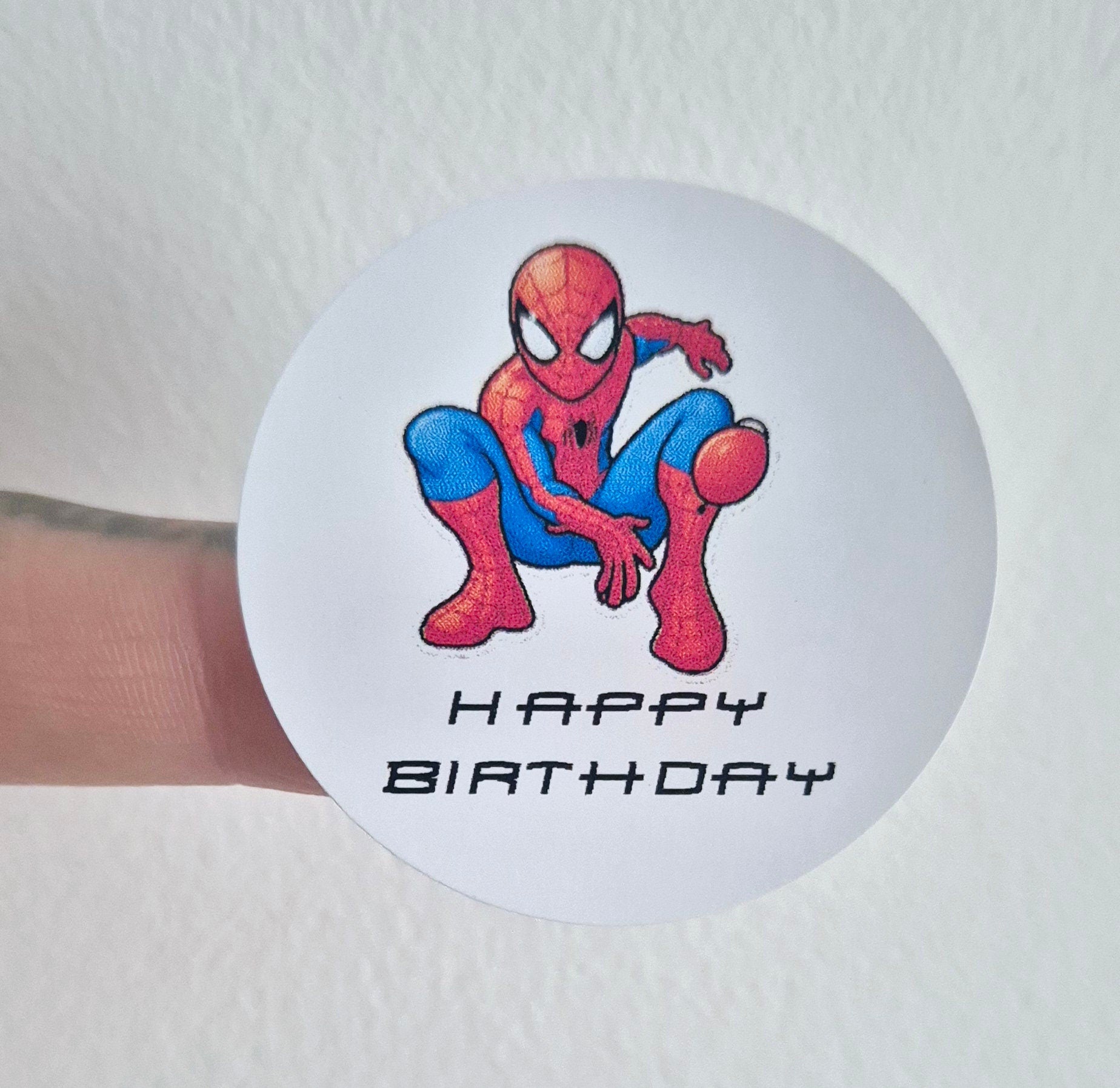 Spider-man inspired themed stickers- 24 Glossy stitch stickers- 45mm circular stickers a4 sheet - 24 in total